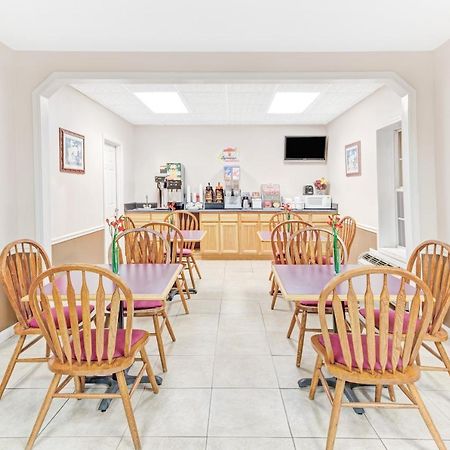 Super Inn & Suites Каролтън Екстериор снимка
