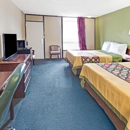 Super Inn & Suites Каролтън Екстериор снимка